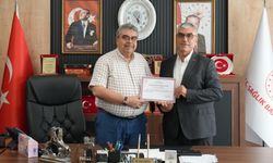 HBB Muhtarlıklar Daire Başkanı Sönmez’e Teşekkür Belgesi