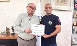 Erdemli ilçesinde baraka yangınını söndüren belediye çalışanlarına teşekkür belgesi