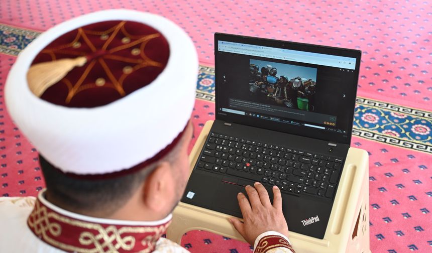 Kadirli İlçe Müftüsü Etik ve din görevlileri, AA'nın 'Yılın Kareleri' oylamasına katıldı